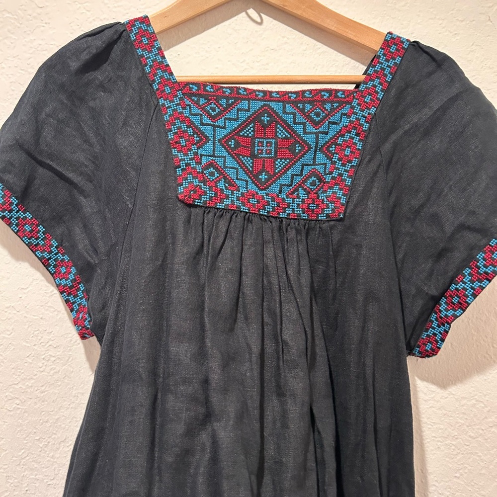 Embroidered Black Top with Red and Blue Accents